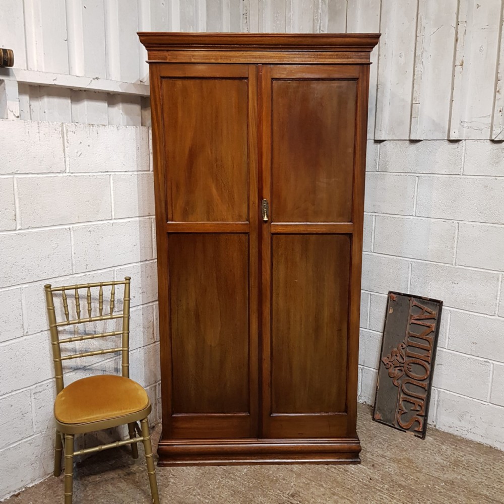 AN EDWARDIAN MAHOGANY FITTED WARDROBE C1900
