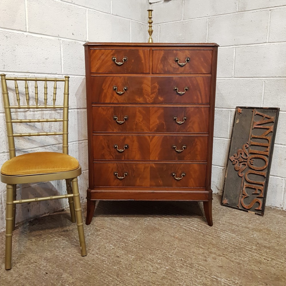 A MAHOGANY 5 HEIGHT CHEST OF DRAWERS C1920