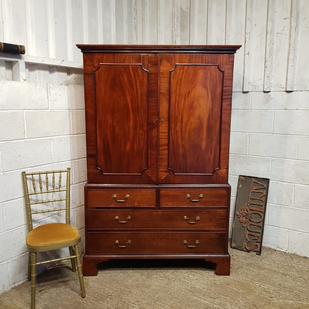 A REGENCY MAHOGANY CLOTHES PRESS C1810