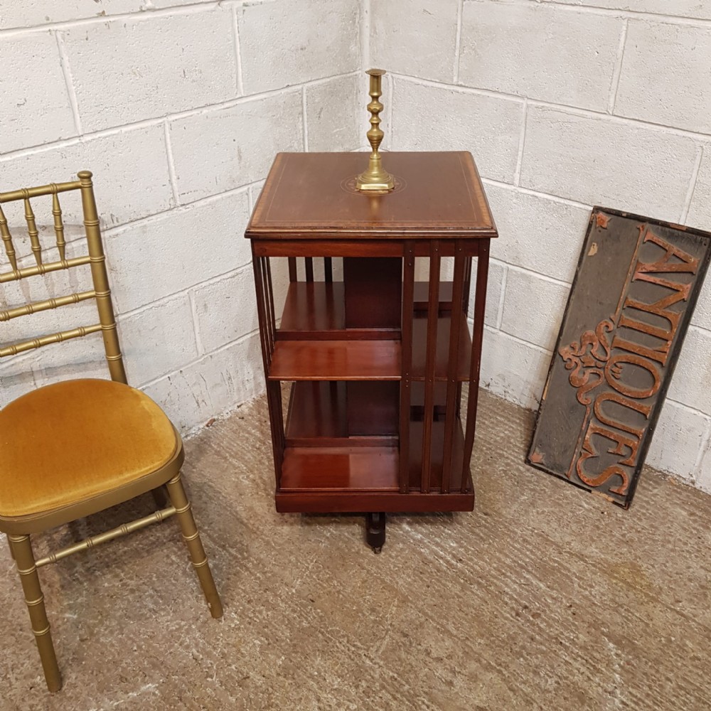 AN EDWARDIAN MAHOGANY REVOLVING BOOKCASE C1900