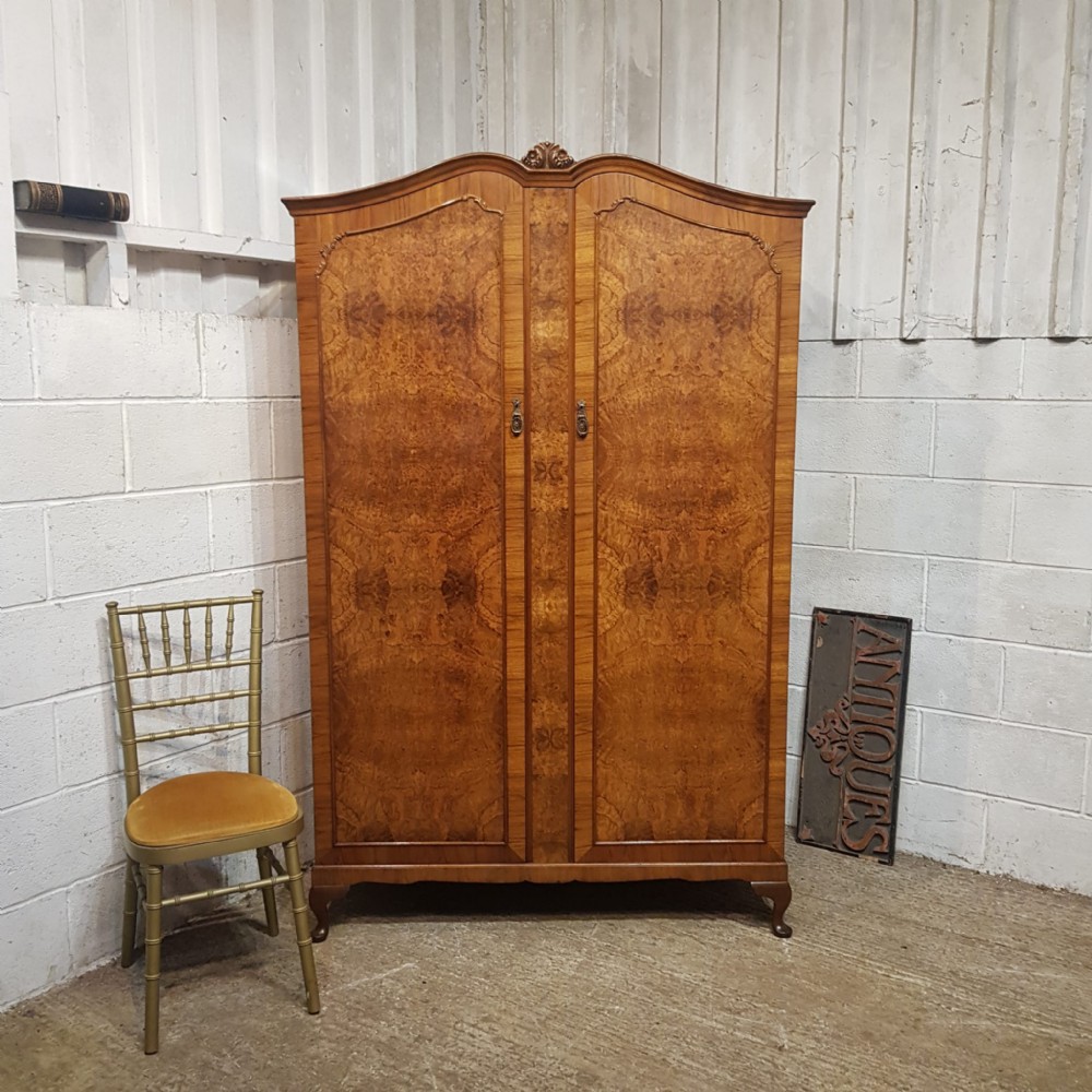 A BURR WALNUT DOUBLE WARDROBE C1920