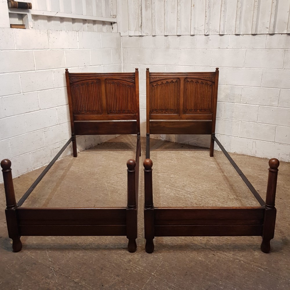 A PAIR OF OAK SINGLE BEDS C1920