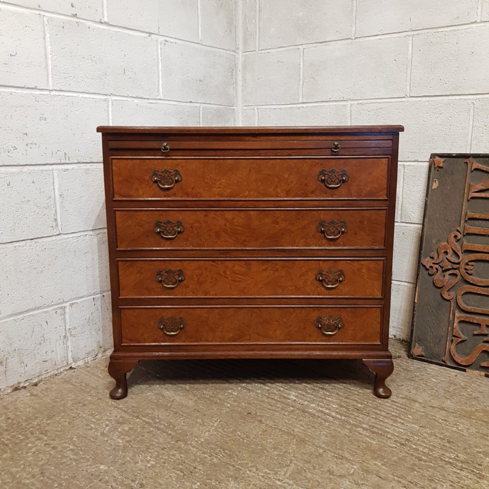 A BURR WALNUT BACHELORS CHEST OF DRAWERS C1920