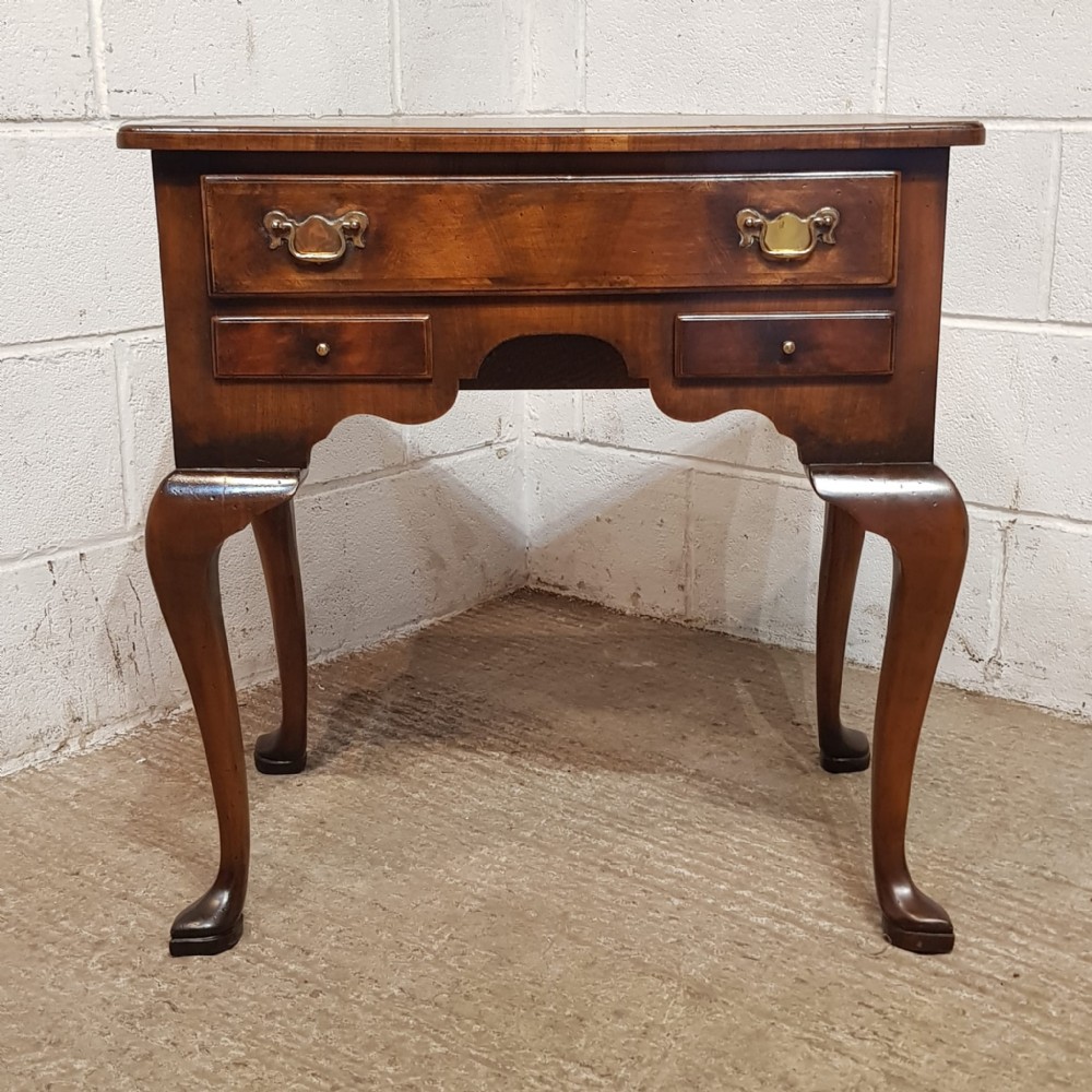 A BURR WALNUT LOWBOY C1920