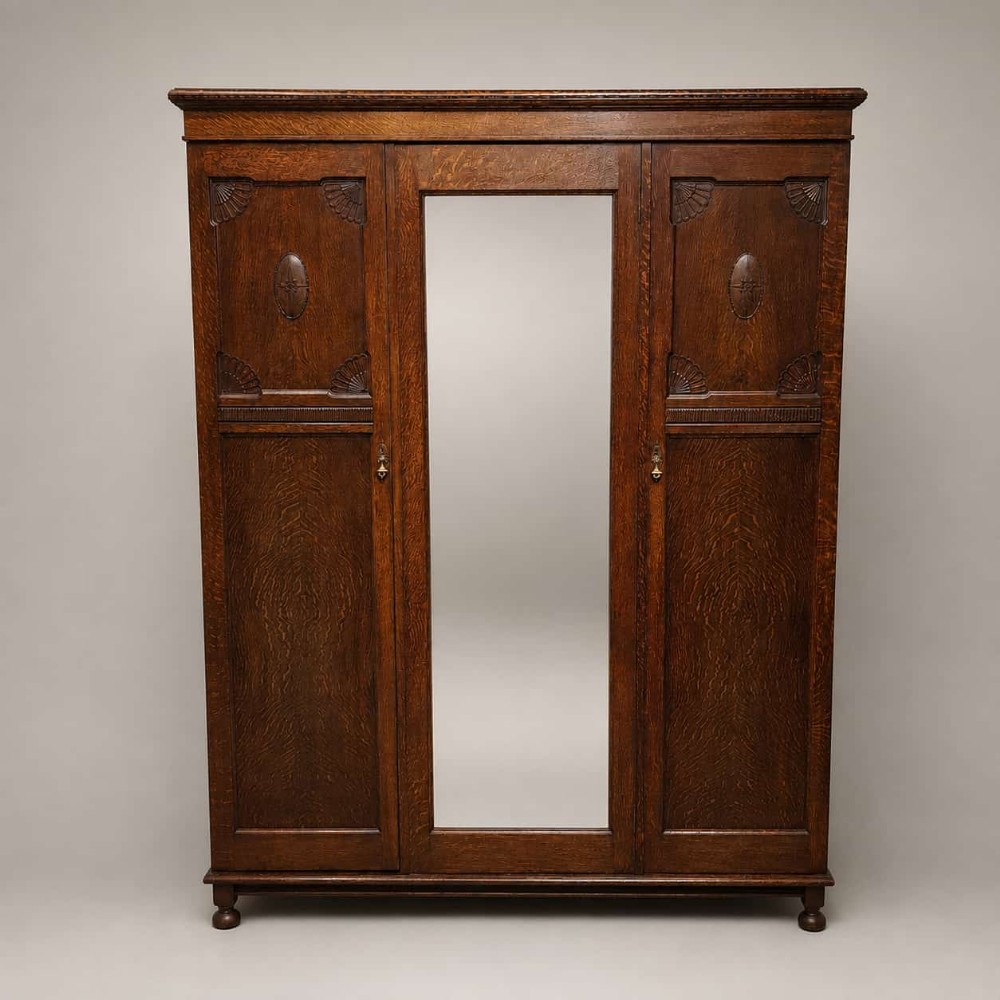 AN OAK TRIPLE WARDROBE C1920