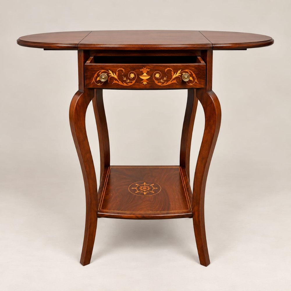 A Victorian rosewood drop leaf occasional table featuring marquetry floral inlay on the drawer, slender cabriole legs, and a lower shelf with a central inlaid medallion.