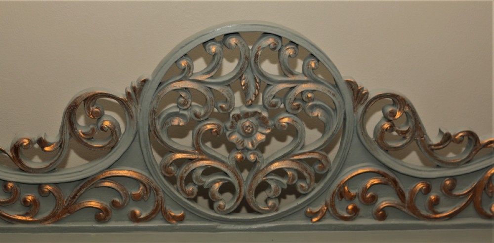 A Mid-Victorian painted grey and parcel-gilt console table featuring an intricate pierced scrollwork crest, lion mask carvings, and cabriole legs. View IX