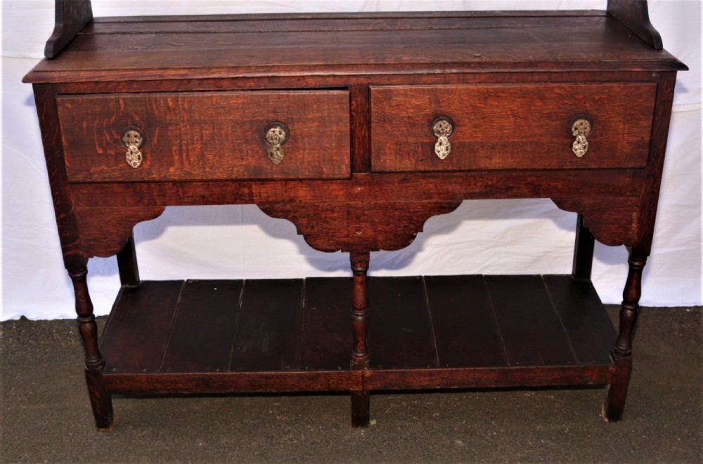 A small antique oak welsh dresser. View II