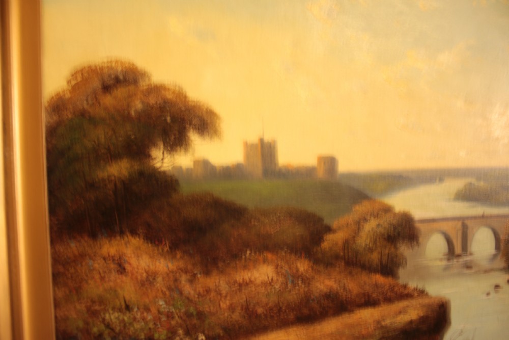 A framed landscape oil painting on canvas depicting Richmond Castle, a stone river bridge, and dense foliage beneath a soft blue sky. View VIII