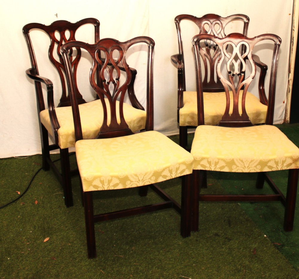 4 chippendale style chairs.