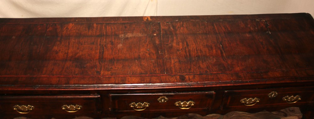 A rare period walnut dresser base. View VI