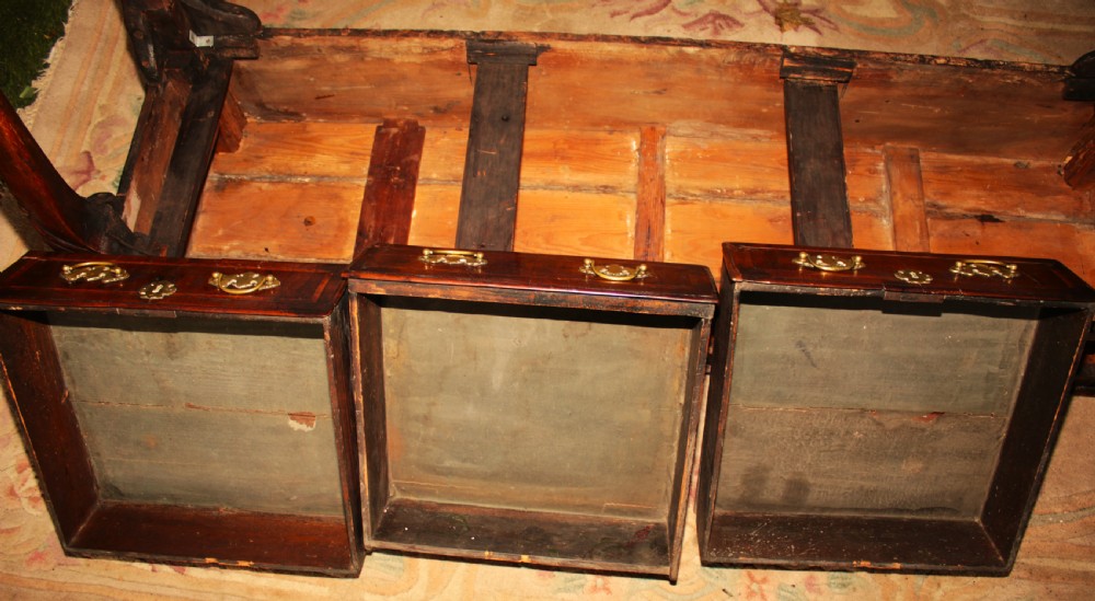 A rare period walnut dresser base. View XVI