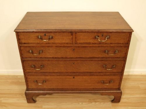 An Oak and Mahogany Cross Banded George III Chest of Drawers
