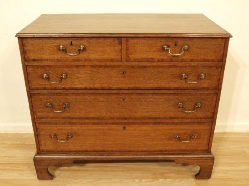 fig 1. An Oak And Mahogany Cross Banded George III Chest Of Drawers