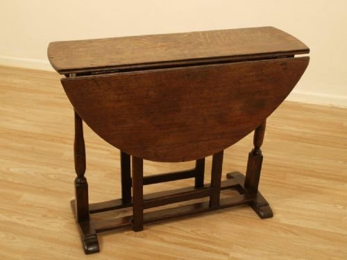 An Oak 18th Century Trestle End Gate Leg Table