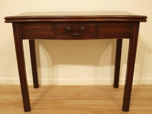 A George III Period Mahogany Fold Over Tea Table