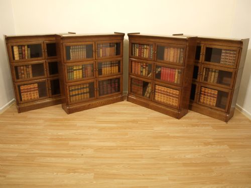 A Good Set of 4 Sectional Bookcases by "Minty" of Oxford