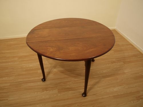 A Cuban Mahogany George III Period Pad Foot Dining Table