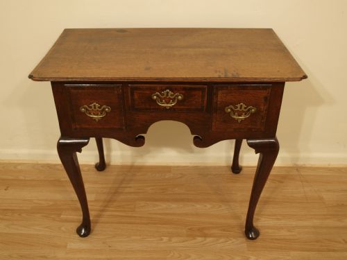 An Oak George III Period Lowboy