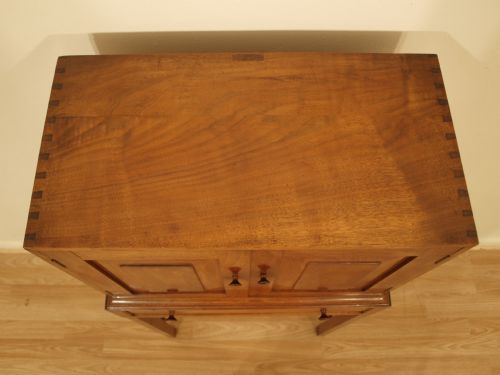 fig 1. A Walnut Cotswold School Cabinet On Stand