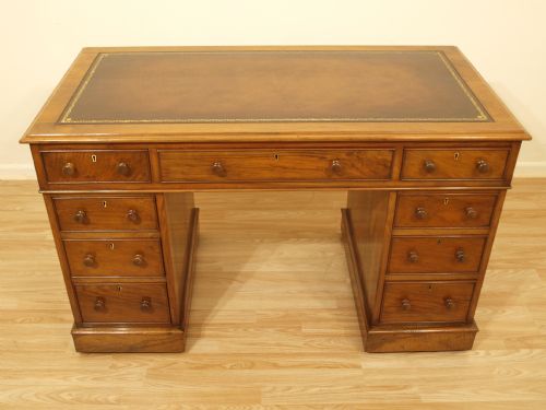 A Beautiful Figured Walnut Victorian Pedestal Desk
