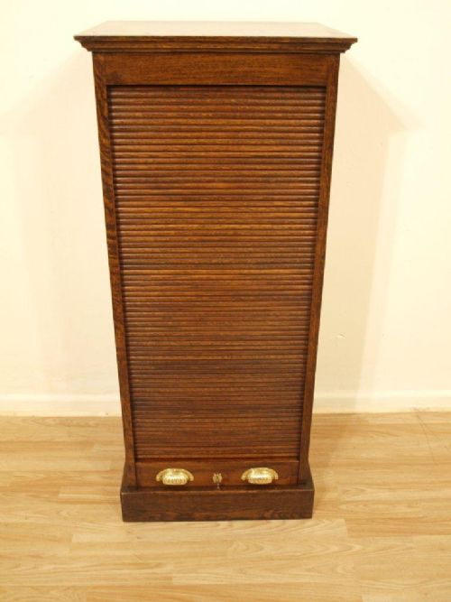 A 1920s Solid Oak Filing Cabinet