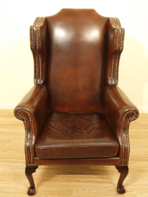 A Good Georgian Style Leather Wing Arm Chair