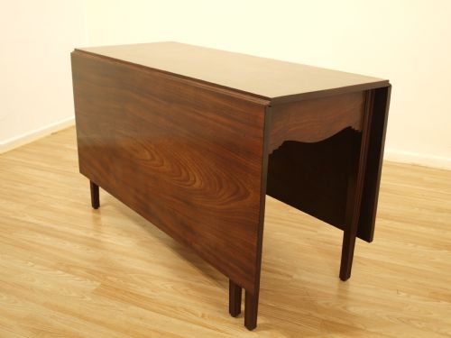 A Cuban Mahogany George III Perid Drop Leaf Dining Table