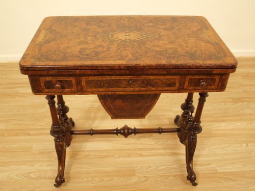 A Burr Walnut Victorian Period Games/sewing Table