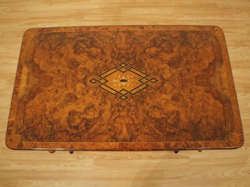 fig 1. A Burr Walnut Victorian Period Games/Sewing Table