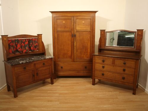 A Rare 4 Piece Arts & Crafts Oak Bedroom Suite by Arthur Simpson