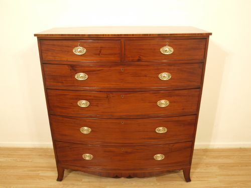 A Large Mahogany Regency Period Bow Front Chest of Drawers