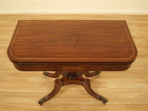 fig 1. A Mahogany Regency Period Brass Inlaid Fold Over Tea Table