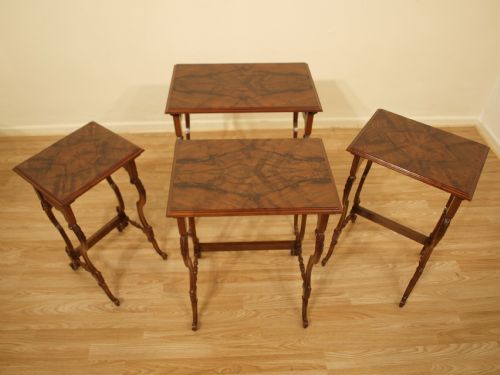 A Walnut Carolean Style Quartetto of Tables