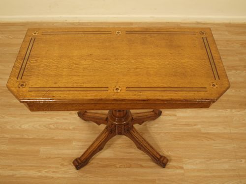 fig 1. An Oak Aesthetic Period Antique Fold Over Card Table