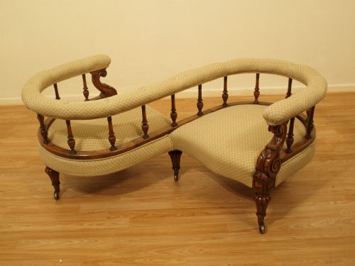 A Rare Walnut Victorian Period Love Seat