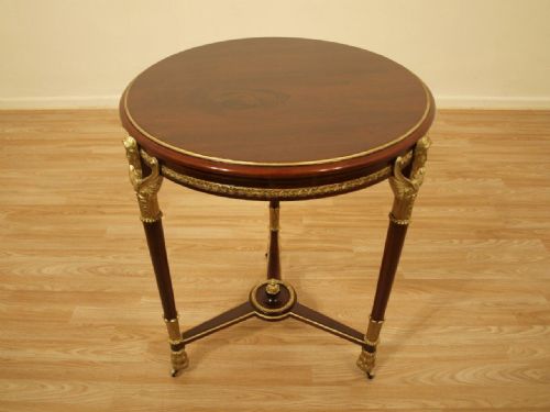 A Mahogany French Empire Style Circular Occasional Table
