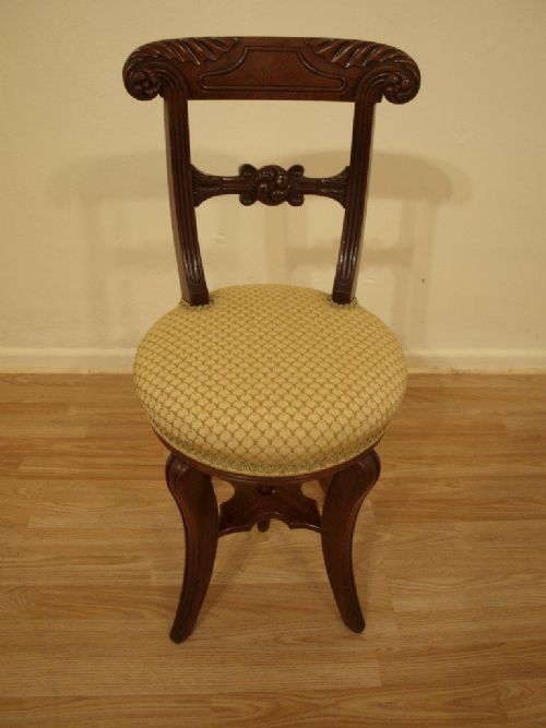 A Mahogany Regency Period Revolving Music/harpist Chair
