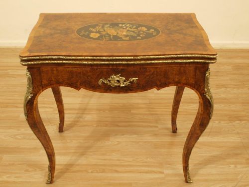 A Burr Walnut, Kingwood & Marquetry Victorian Fold Over Games Table