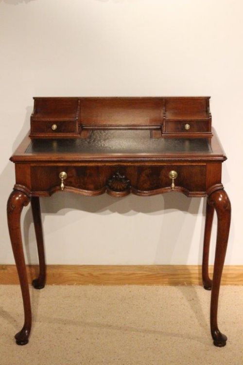 A Walnut George I Style Antique Writing Table by Waring & Gillows