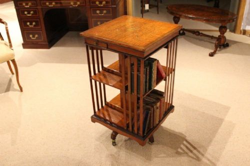 A Satinwood Inlaid Late Victorian Period Antique Revolving Bookcase