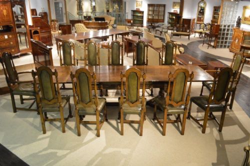 An Oak Jacobean Style Refectory Table & Set 12 Oak Dining Chairs