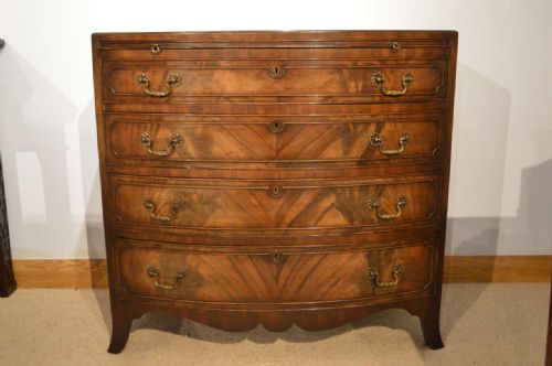 A Mahogany Regency Style Bow Front Antique Bachelors Drawers