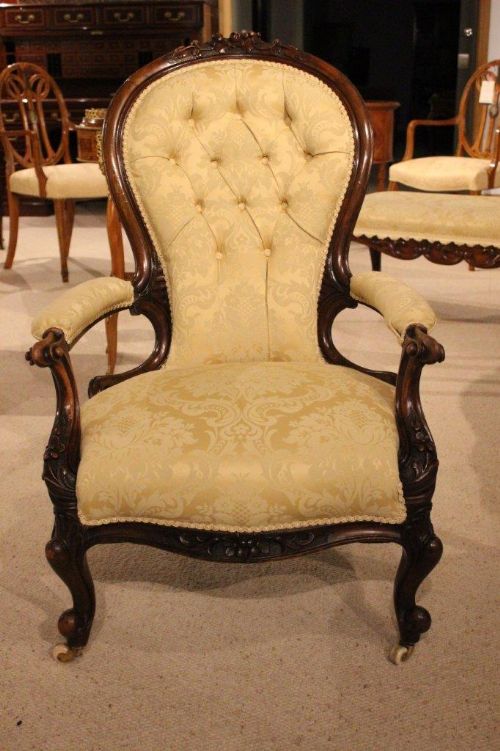 A Walnut Victorian Period Carved Open Armchair