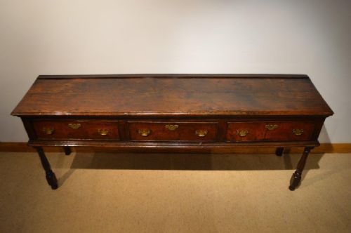 fig 1. An Oak Georgian Period Three Drawer Dresser Base