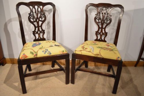 A Pair of Mahogany "Country" Chippendale Period Dining Chairs