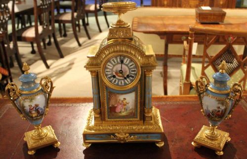 fig 1. A French 19th Century Gilt Bronze & Sevres Clock Garniture