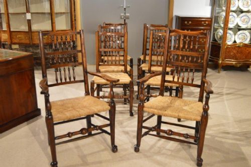 A Harlequin Set of 8 Ash & Elm Lancashire Spindle Back Dining Chairs
