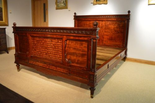 A Stunning Quality French "Plum Pudding" Mahogany Antique Kingsize Bed