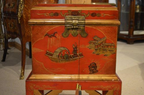 fig 1. A Red Lacquer Chinoiserie Cellaret On Stand